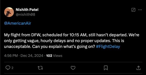 X post from user @nishith08 saying, "@AmericanAir my flight from DFW, scheduled for 10:15 AM, still hasn't departed. We're only getting vague, hourly delays and no proper updates. This is unacceptable. Can you explain what's going on? #FlightDelay"